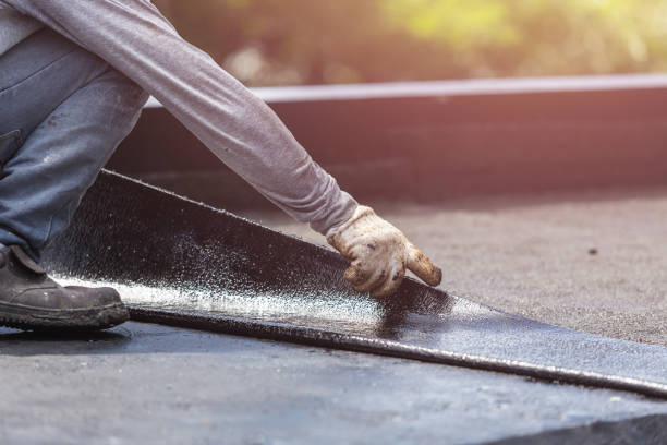 Professional Waterproofing technician working in Plainfield, WI